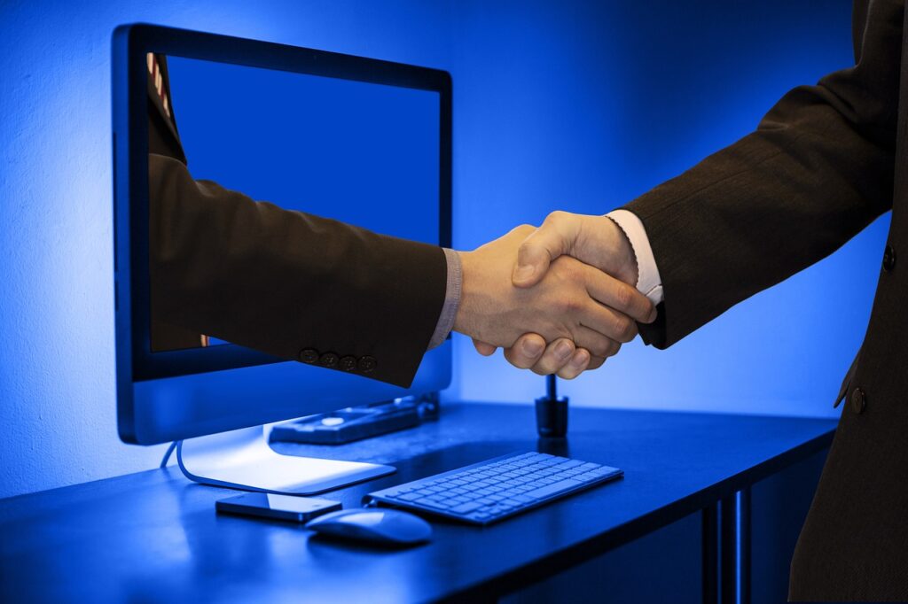 handshake, hands, monitor-3962172.jpg